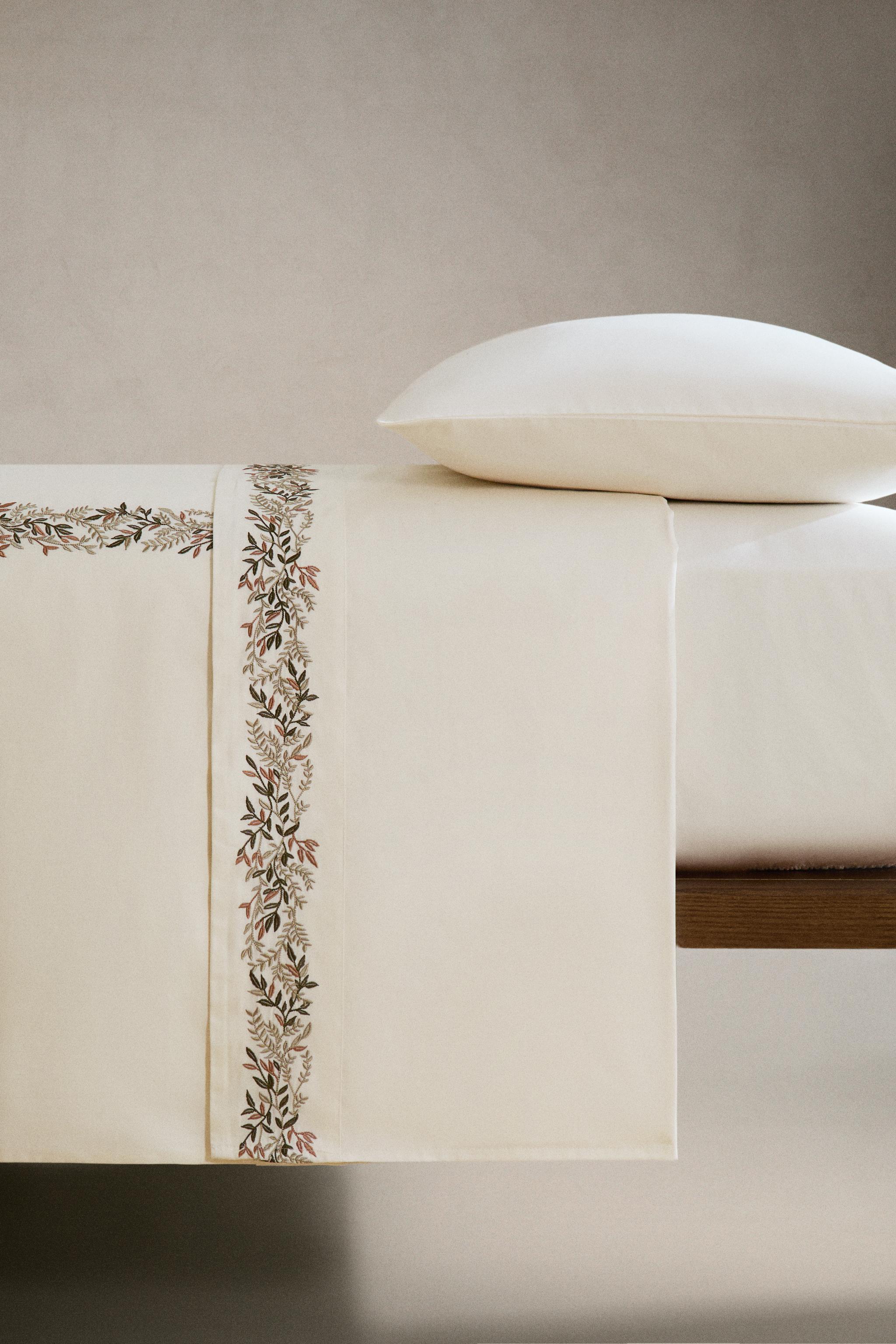 SATEEN FLAT SHEET WITH EMBROIDERED LEAVES